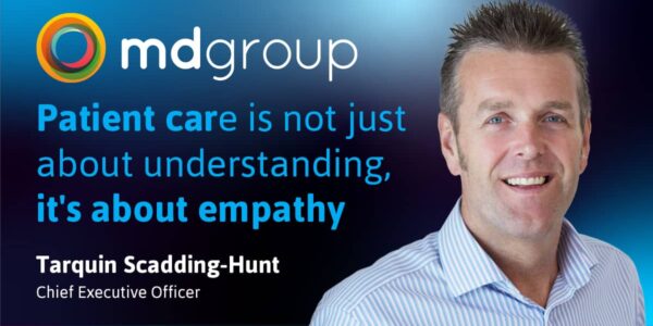 Tarquin smiling, text reads: patient care is not just about understanding it's about empathy
