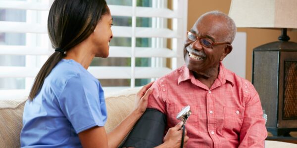 nurse taking a patient's blood pressure