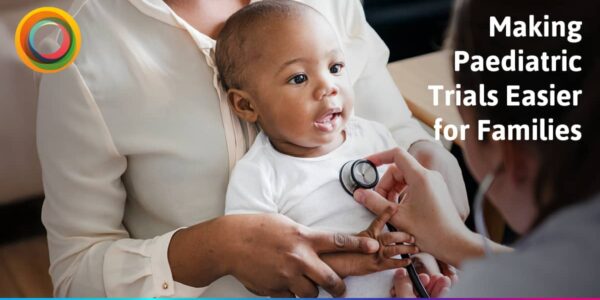 nurse checking heart health from a baby in a white bodysuit in paediatric clinical trial
